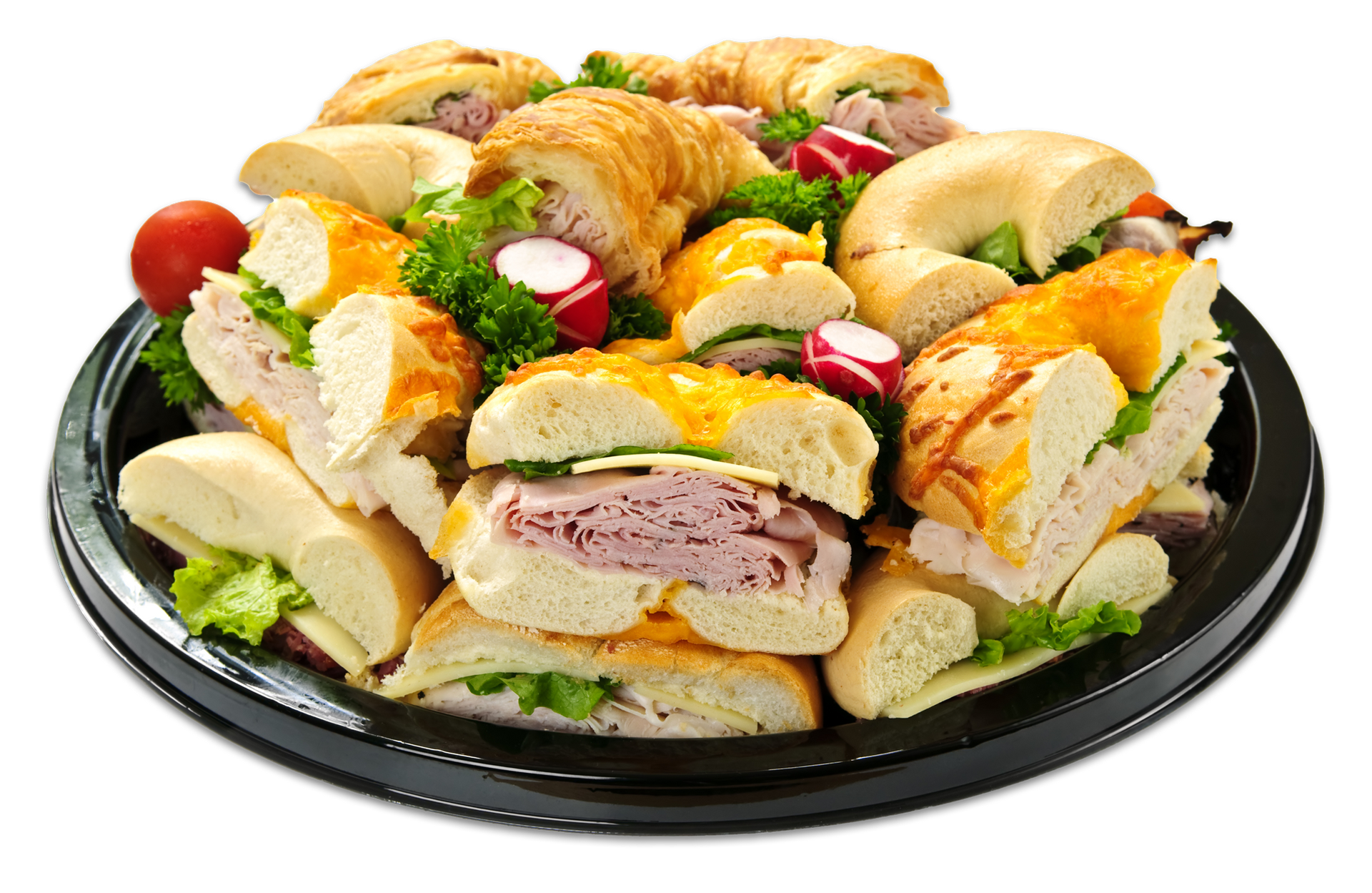 A tray filled with sandwiches and vegetables on a white background