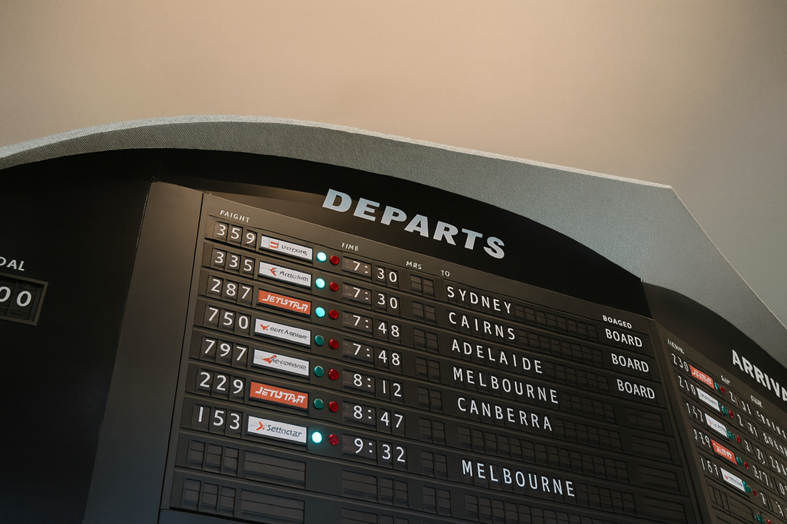 Departure board at an airport, displaying flight information.