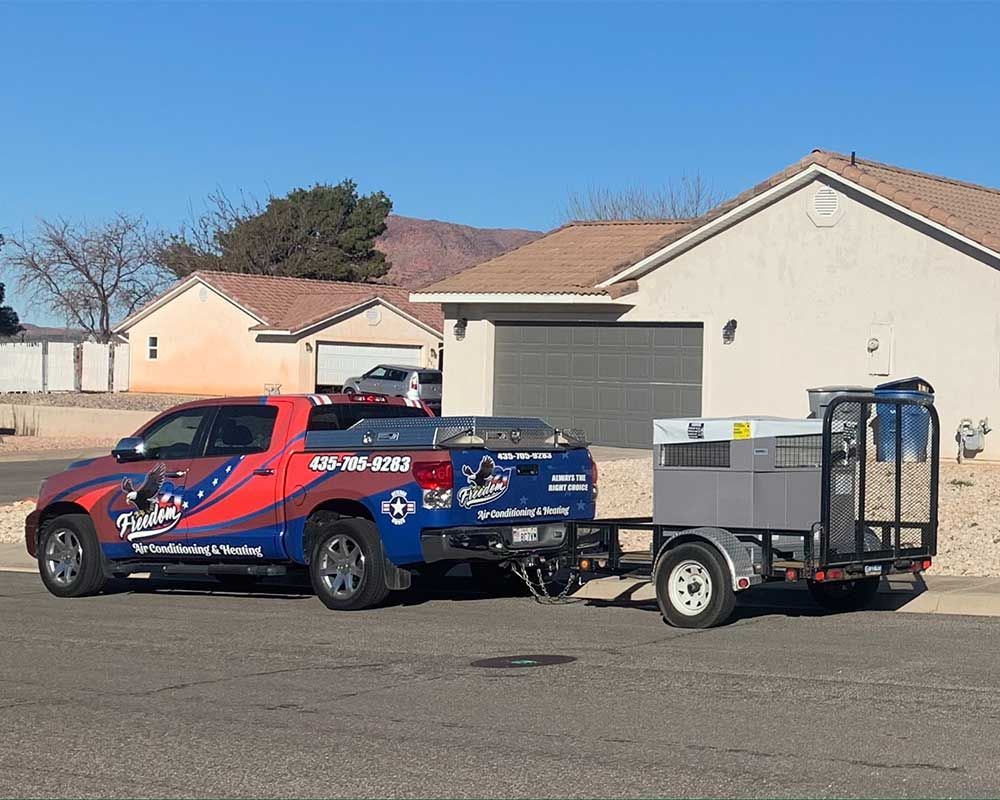 A truck with a trailer attached to it is parked in front of a house.