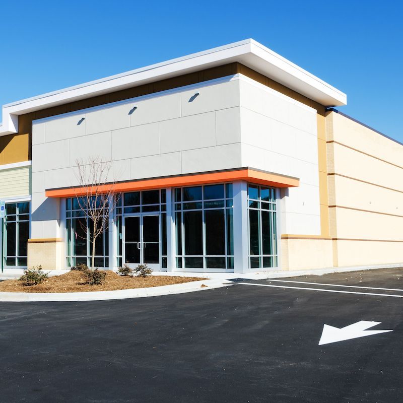 Inside a brightly lit store with wooden shelves displaying various skincare products.