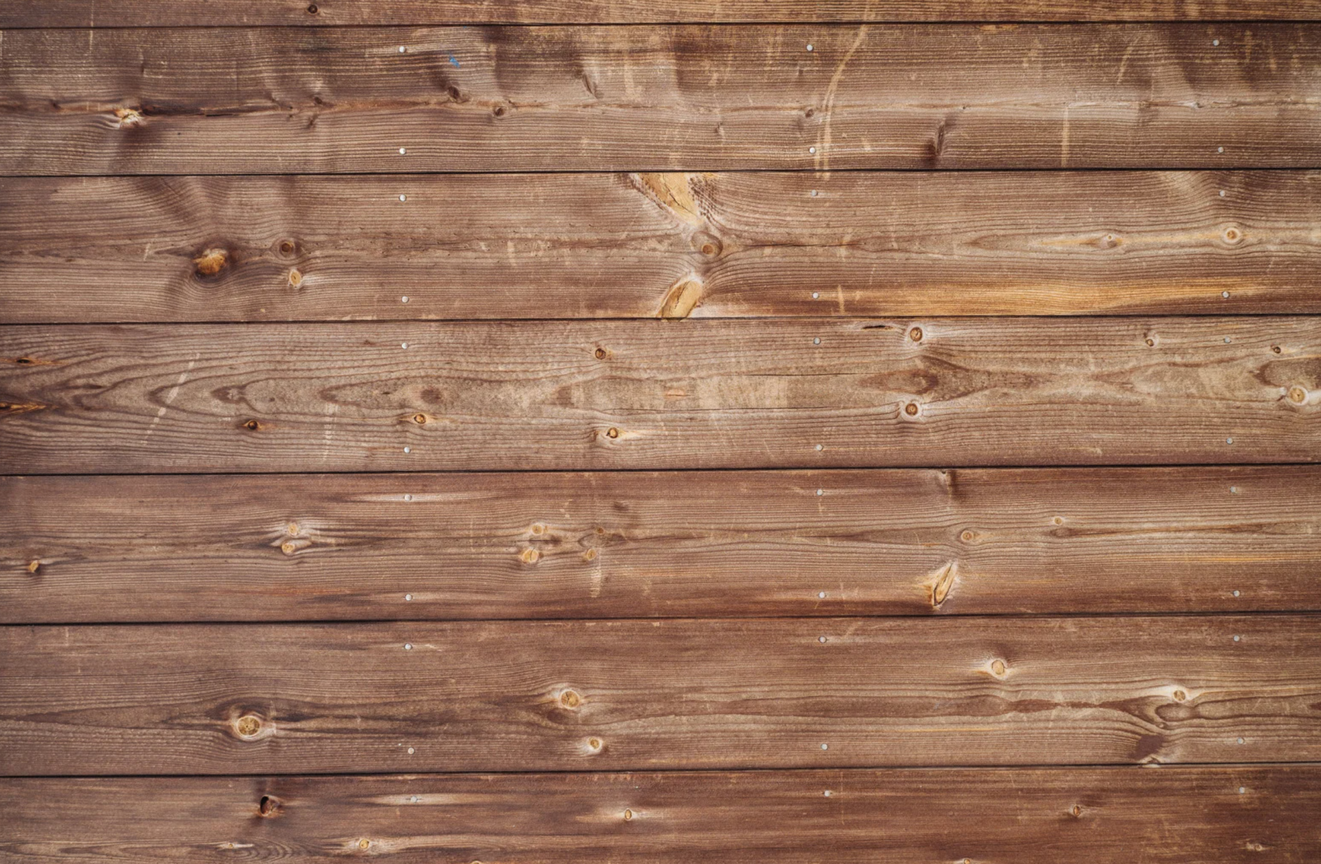 Brown weathered wood planks.