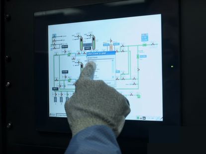 hand pointing at electrical map