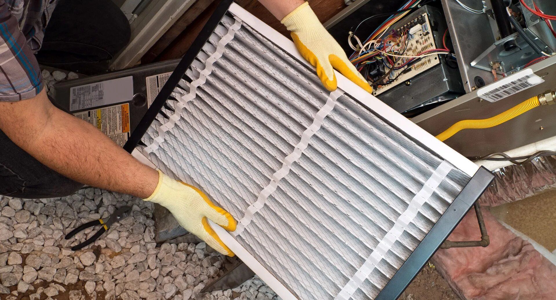 Cleaning HVAC Filter — Madison Heights, MI — Family Heating, Cooling, & Electrical, Inc