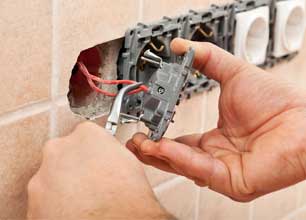 Fixing Electrical Outlet — Madison Heights, MI — Family Heating, Cooling, & Electrical, Inc