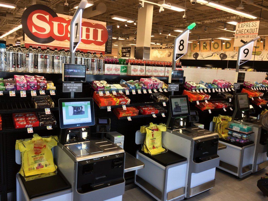 A grocery store with a sign that says sushi on it