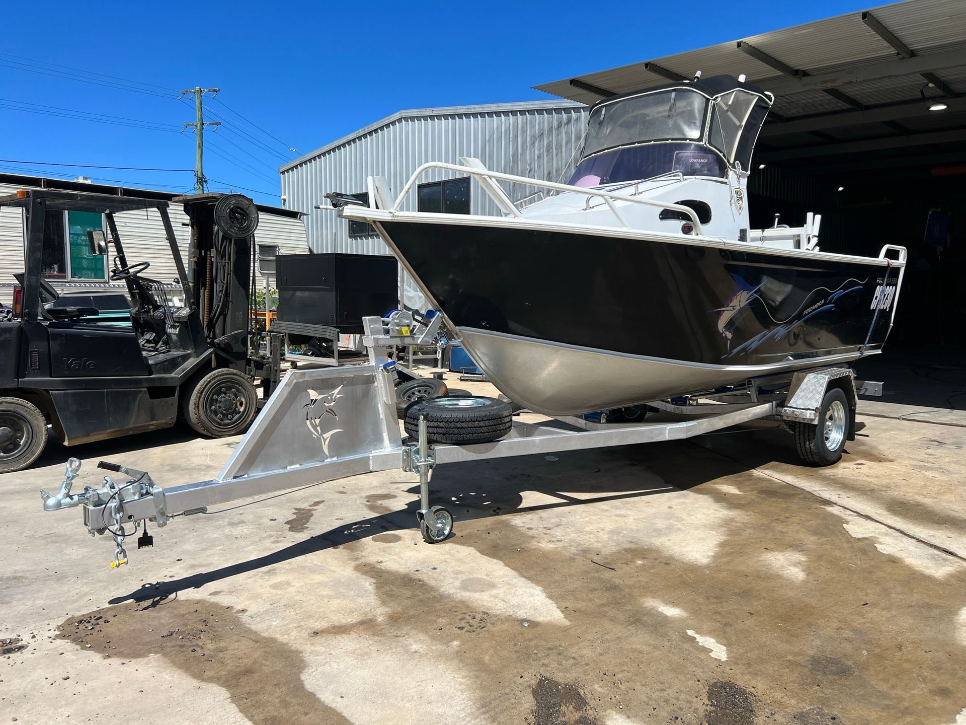 Jet Ski Trailer With Two Jet Skis— Rod's Engineering & Lifetime Trailers in Bli Bli, QLD