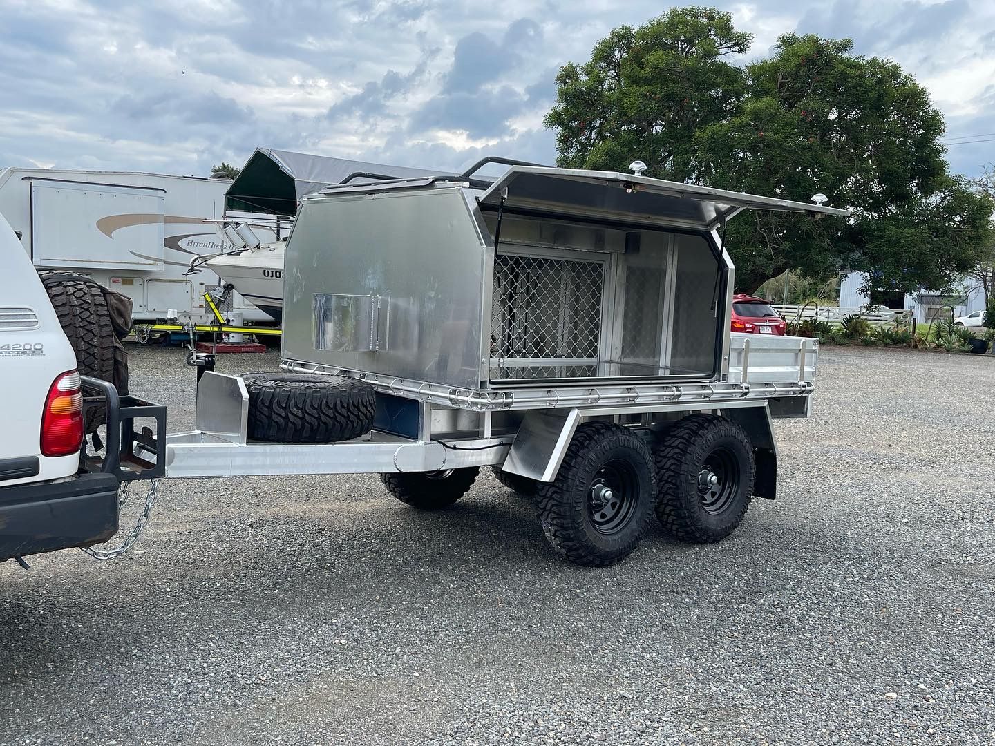 Aluminum Trailer With Tools and Wheelbarrow — Rod's Engineering & Lifetime Trailers in Bli Bli, QLD