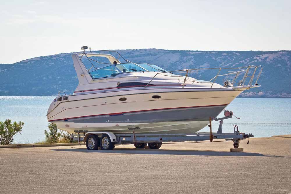 Boat on Trailer Parked on a Paved Surface — Rod's Engineering & Lifetime Trailers in Bli Bli, QLD