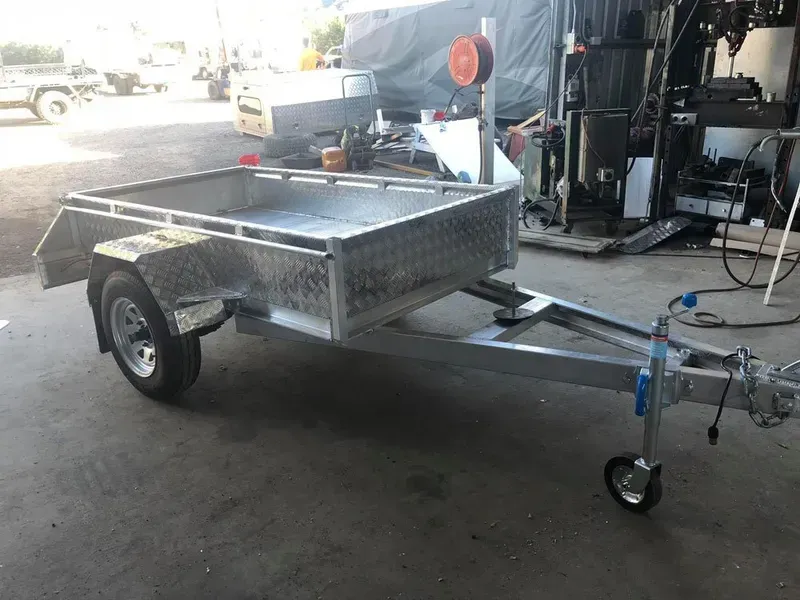 Silver Utility Trailer With Diamond Plate Sides — Rod's Engineering & Lifetime Trailers in Bli Bli, QLD