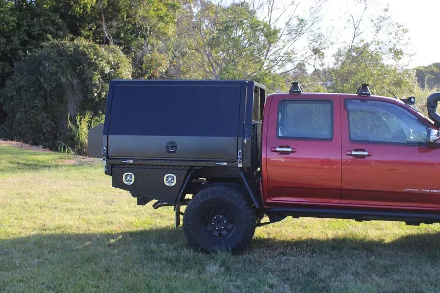 Red Pickup Truck With a Black Utility Bed — Rod's Engineering & Lifetime Trailers in Bli Bli, QLD