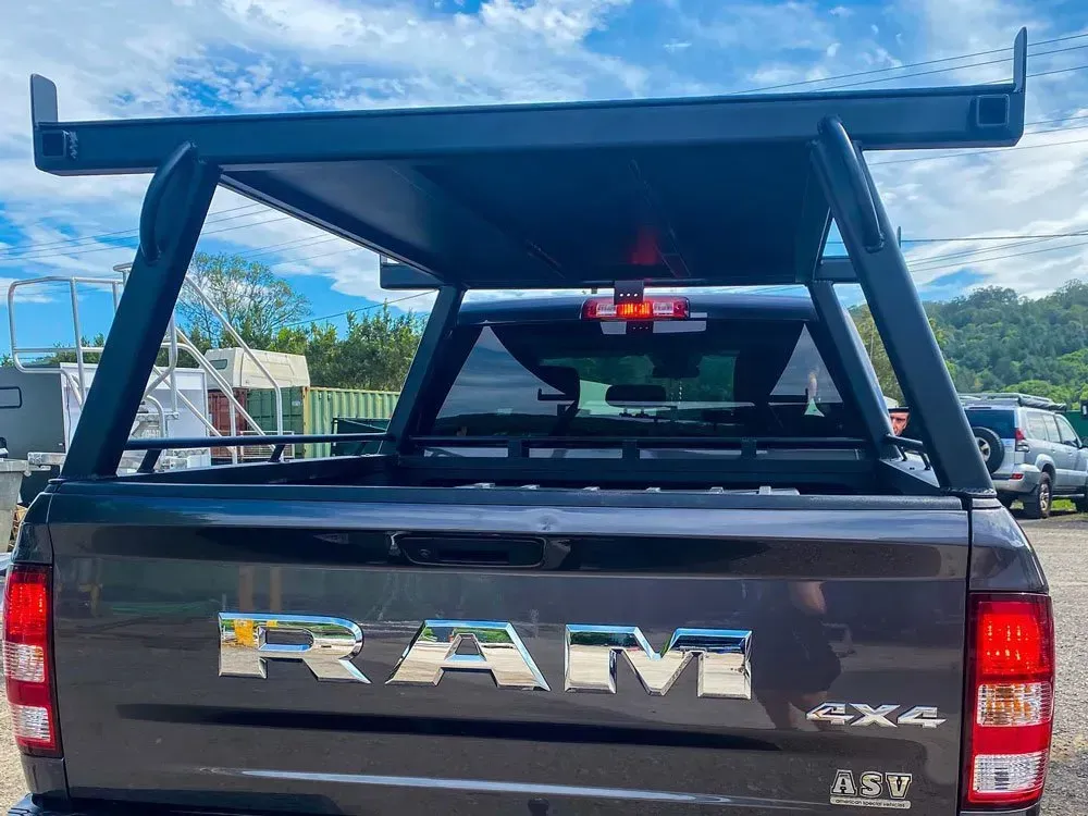 Black Truck Bed Rack on a Dark Brown Ram Pickup Truck — Rod's Engineering & Lifetime Trailers in Bli Bli, QLD