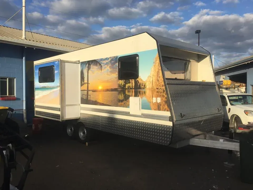 Travel Trailer With Beach Scene Mural on the Side — Rod's Engineering & Lifetime Trailers in Bli Bli, QLD