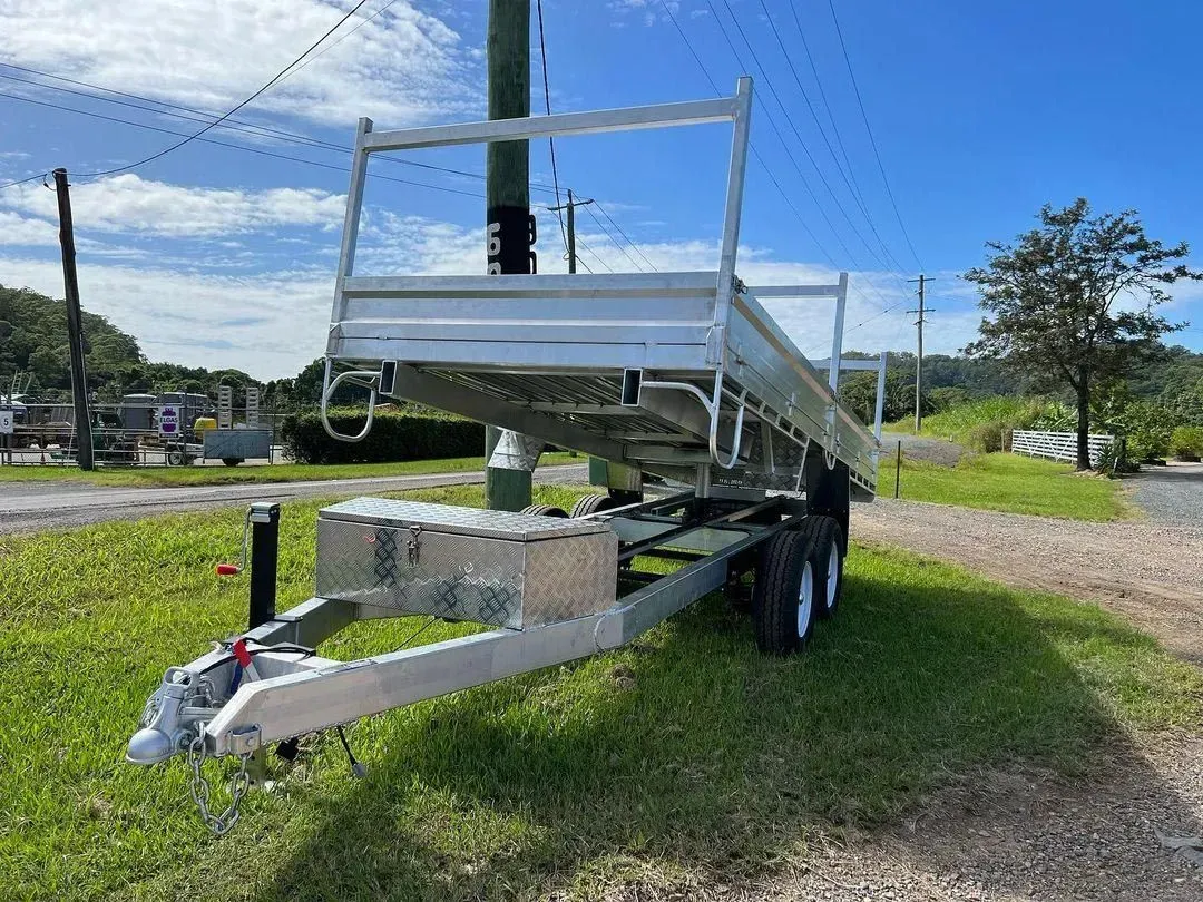 Silver Utility Trailer on a Grassy Area — Rod's Engineering & Lifetime Trailers in Bli Bli, QLD