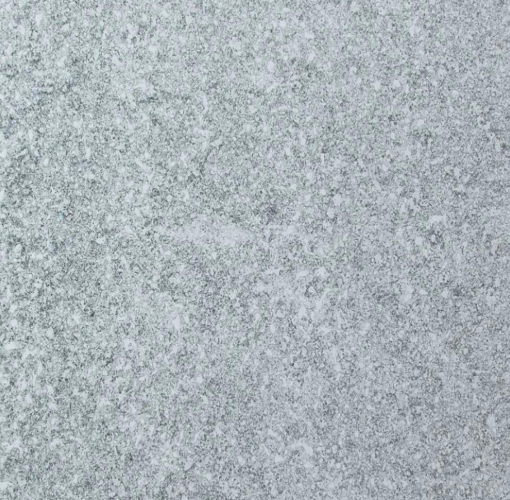 Gray, textured surface with a mottled appearance.