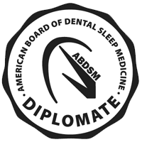 A black and white logo for the american board of dental sleep medicine. A black and white logo for the american board of dental sleep medicine.