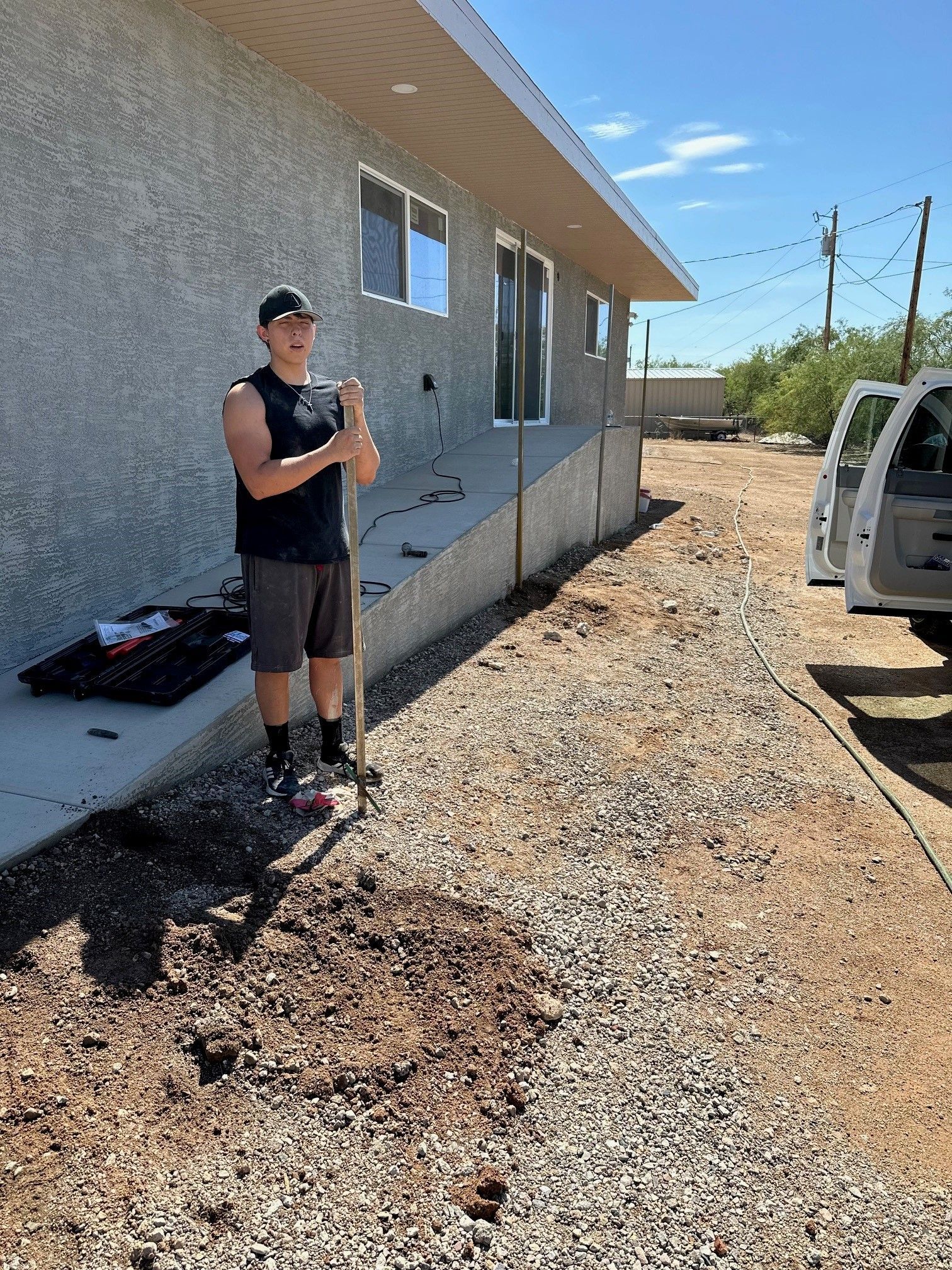 Man Outside the House — Tucson, AZ — D Handyman LLC Rod Iron & Fencing Services