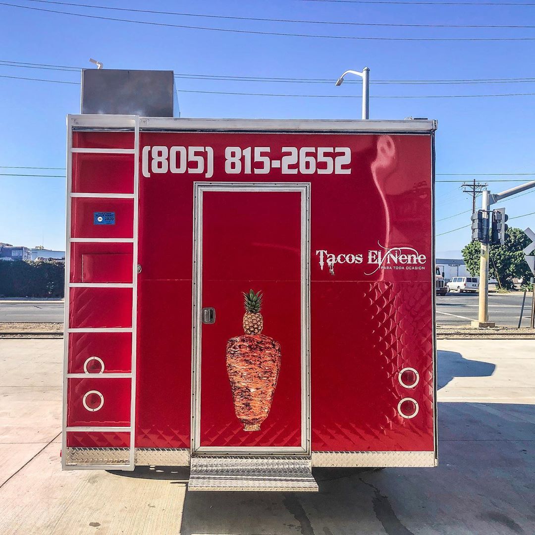 A red food truck with the phone number 805 815-2652