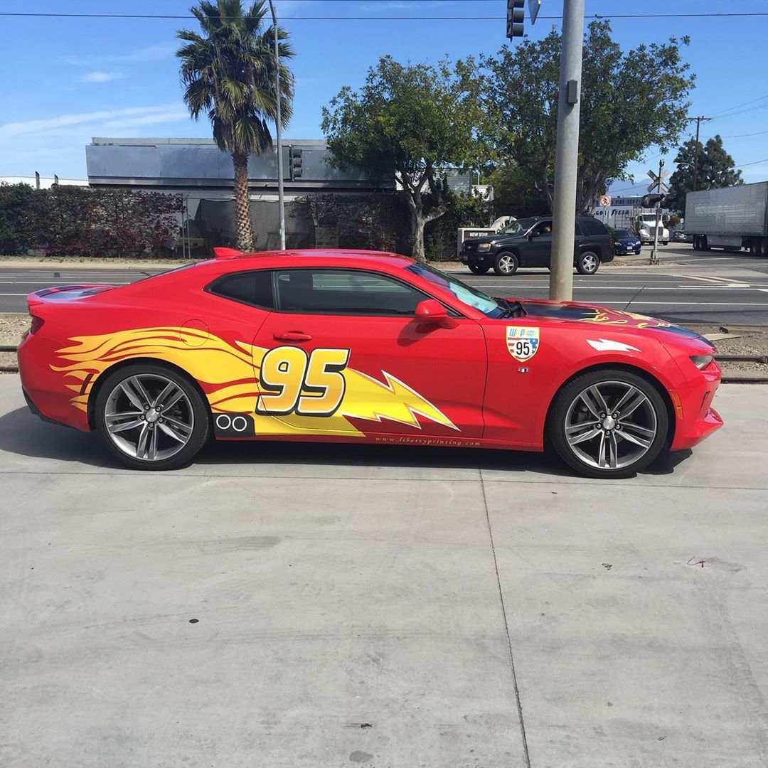 A red car with the number 95 on it