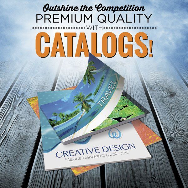 A stack of catalogs with the words outshine the competition premium quality catalogs