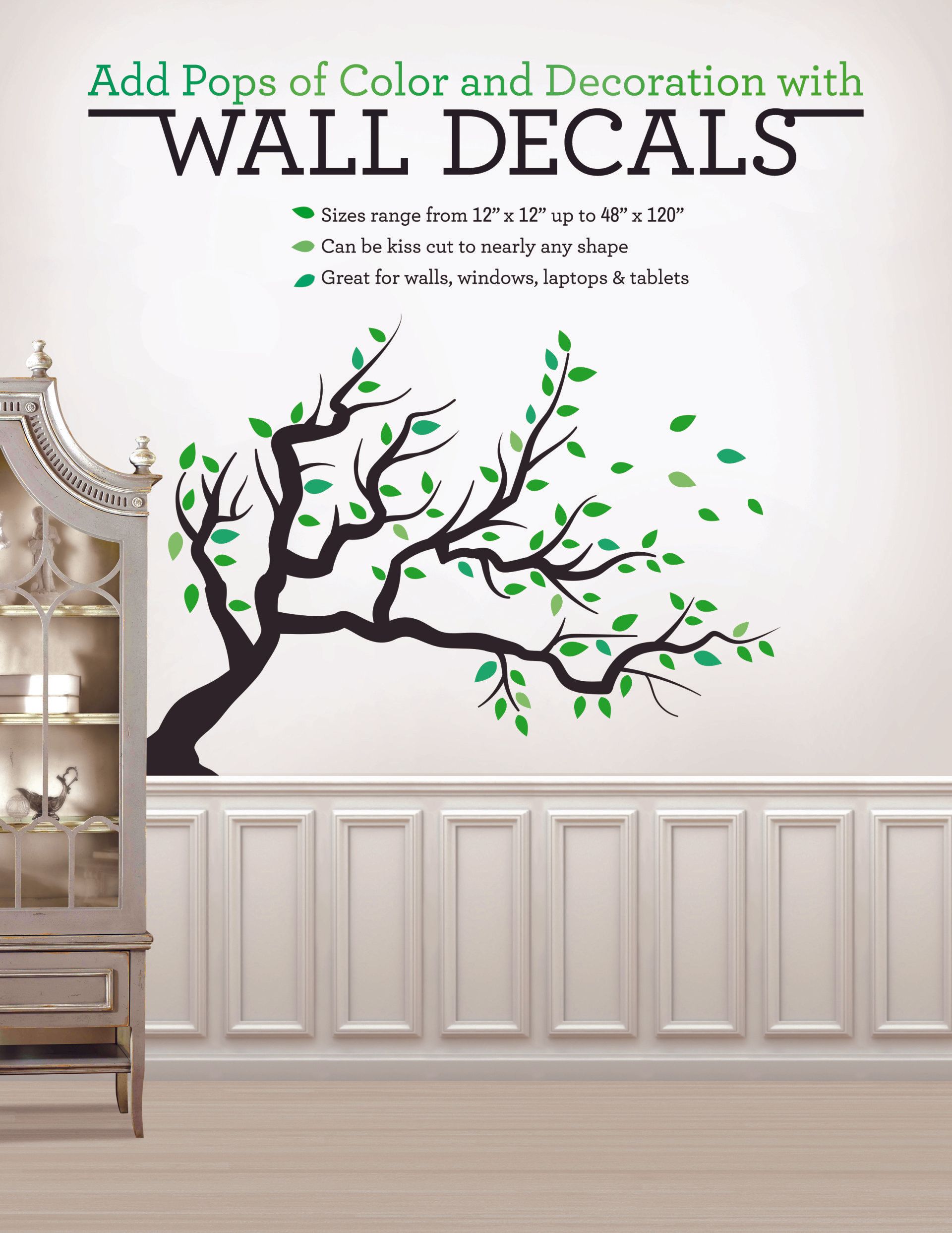 A wall decal of a tree with green leaves on it