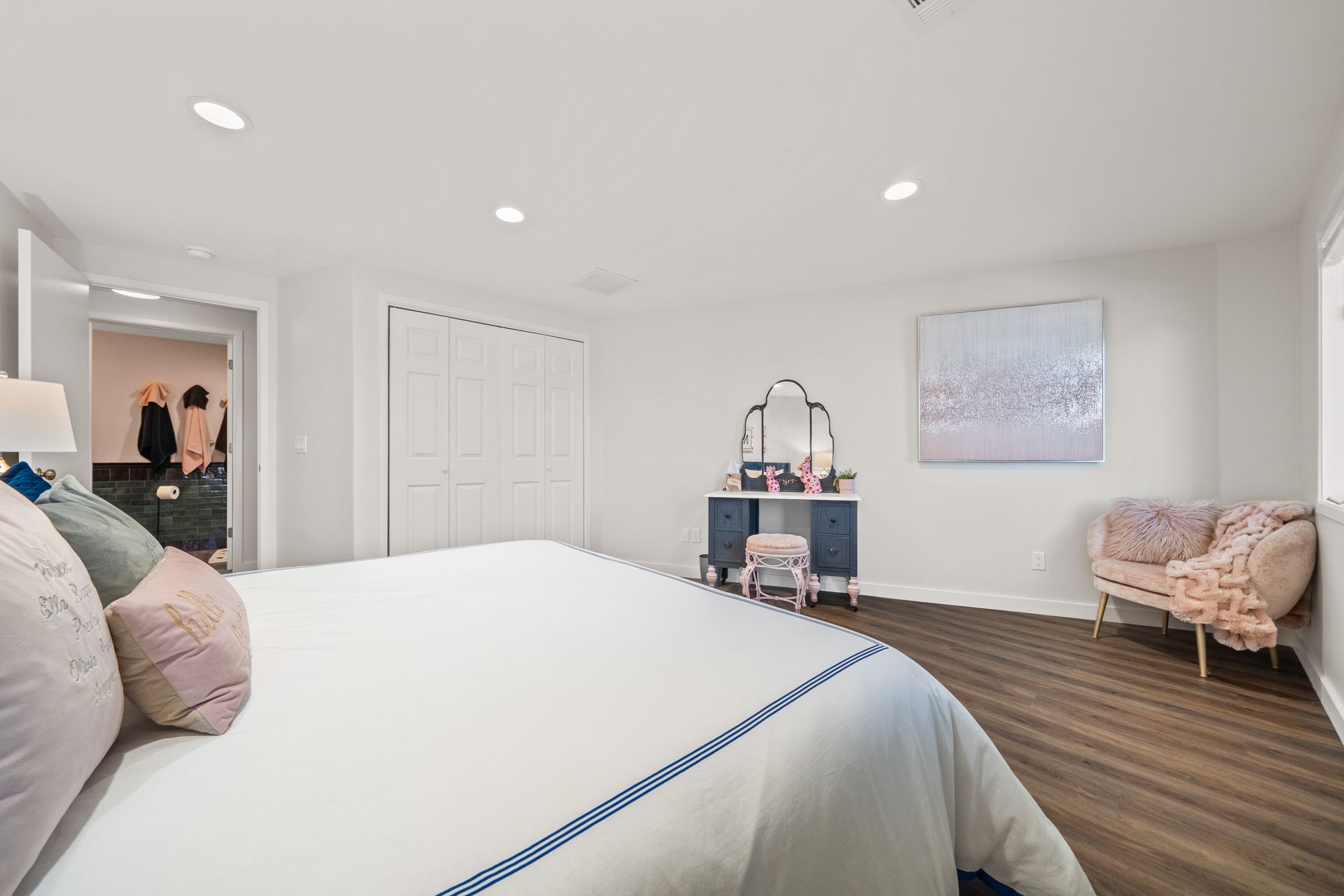 There is a large bed in the middle of the room.