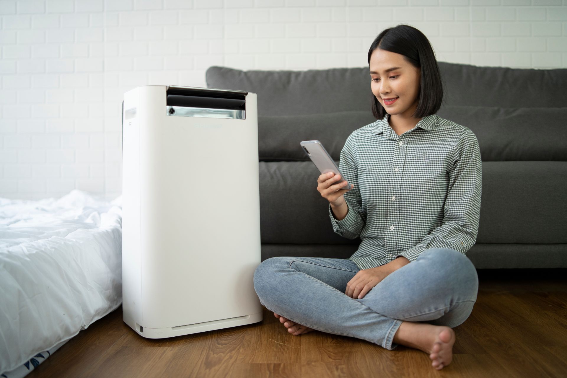 A woman with an air purification system