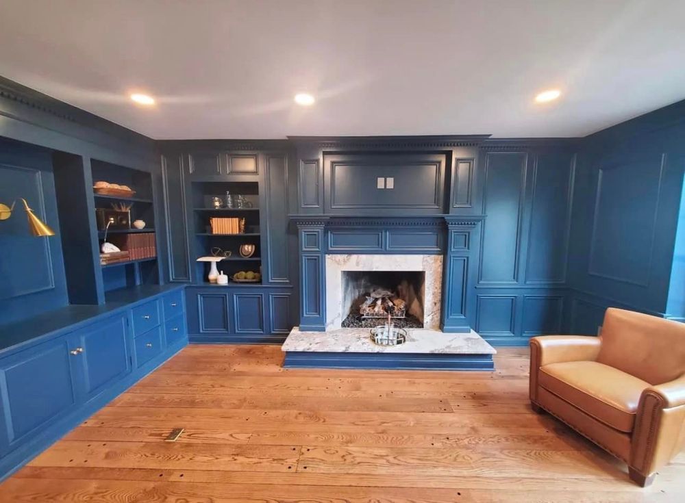 There is a fireplace in the middle of the room.