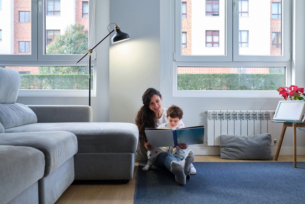 Mother And Son Reading — Thousand Palms, CA — Mendez Air Conditioning and Heating