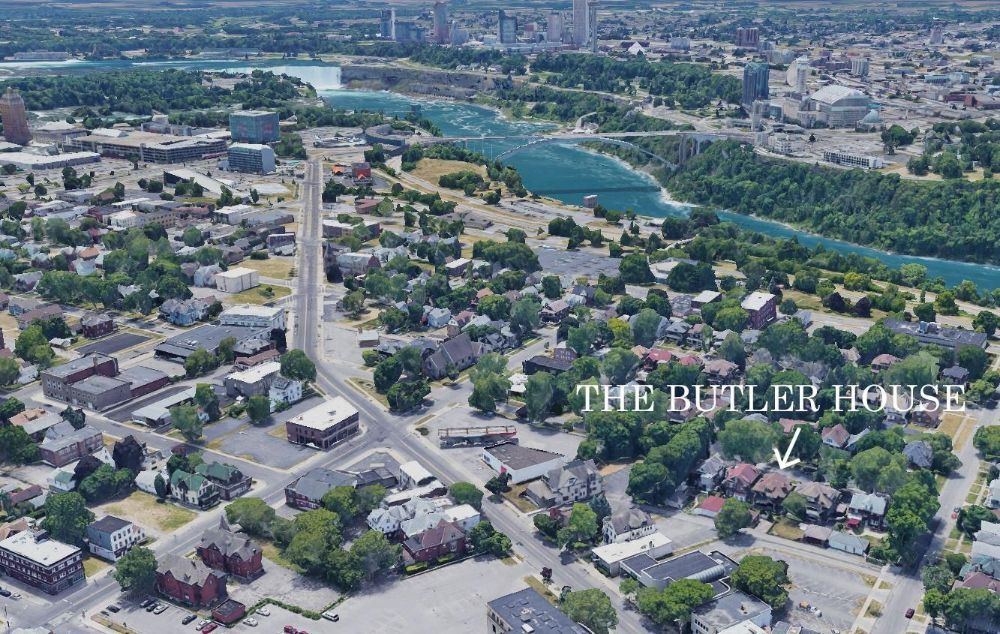 An aerial view of the butler house in a small town