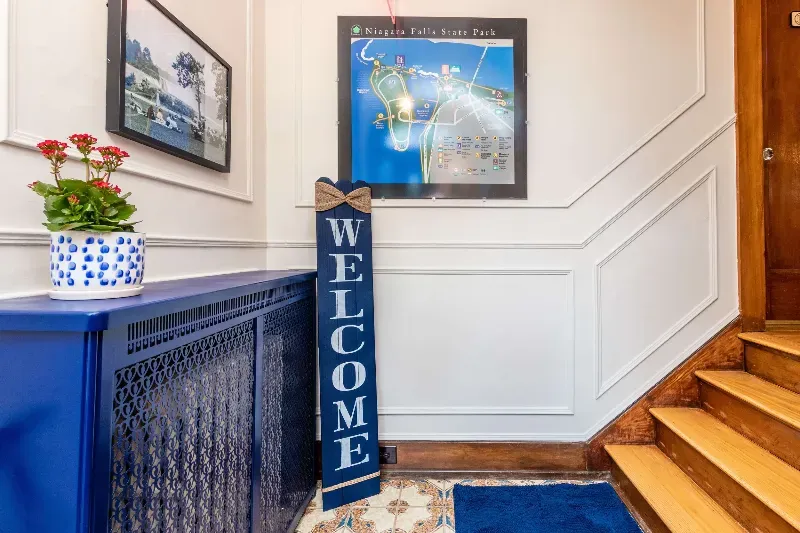 There is a welcome sign in the middle of the hallway.