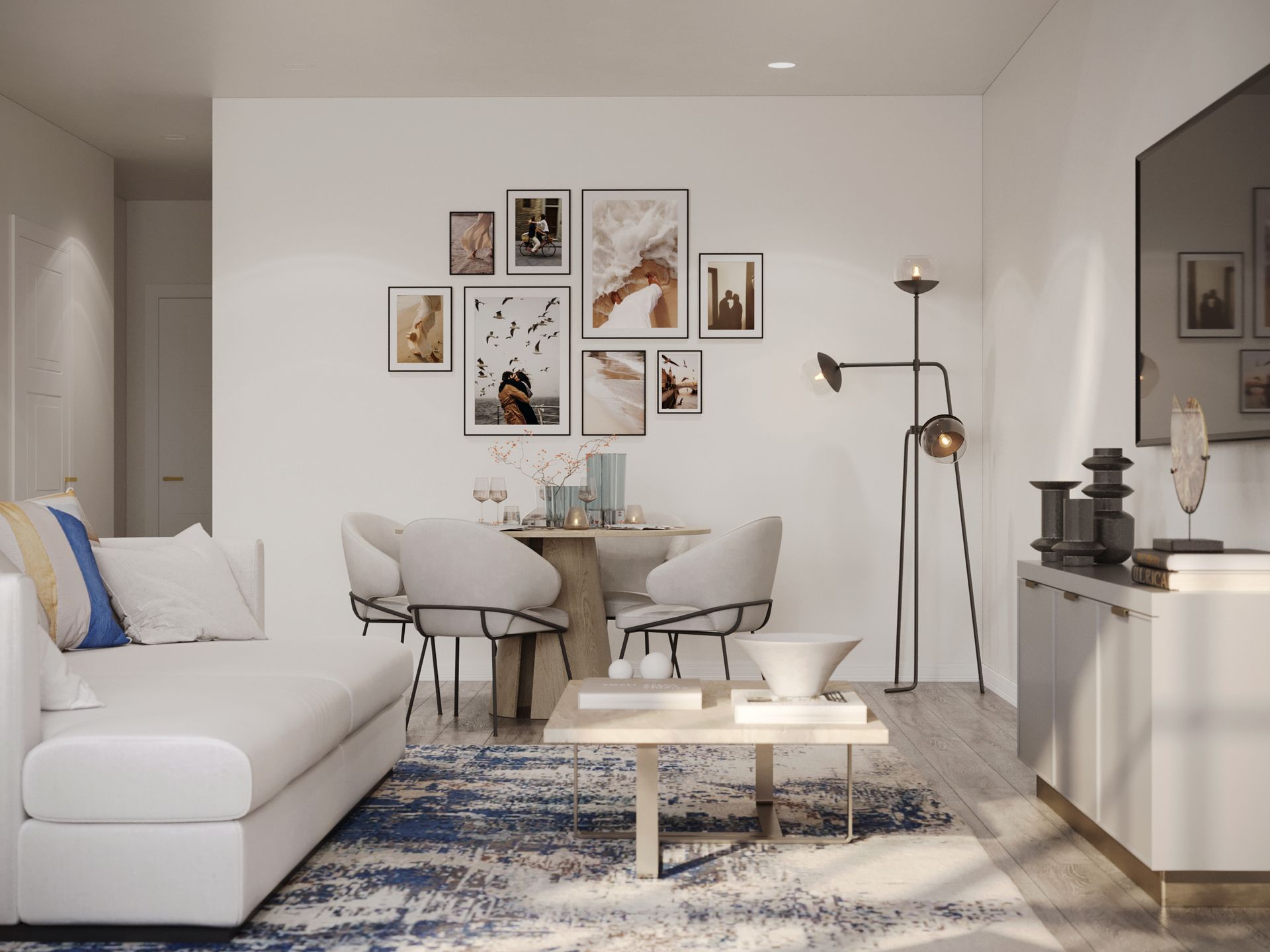 A living room with a couch a table and chairs