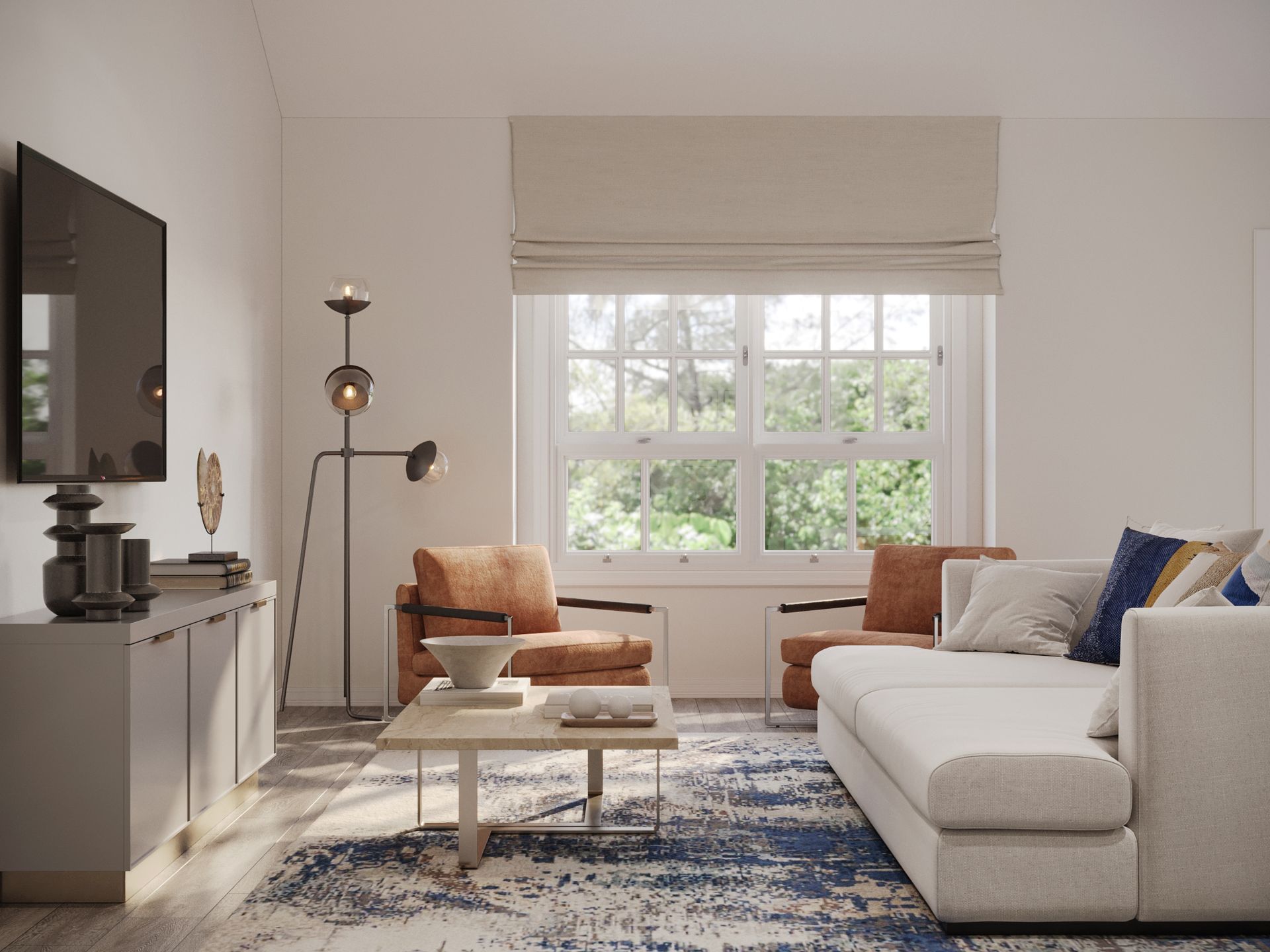 A living room with a couch , chairs , coffee table and television.