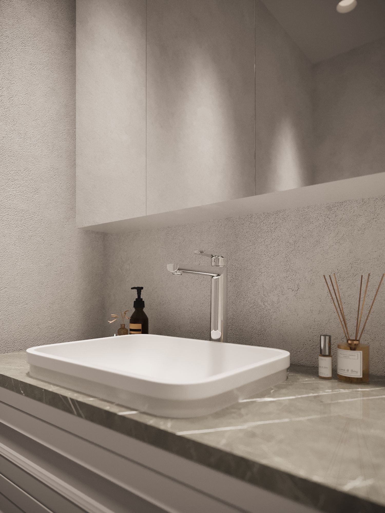 A bathroom sink with a faucet and a soap dispenser on the counter.