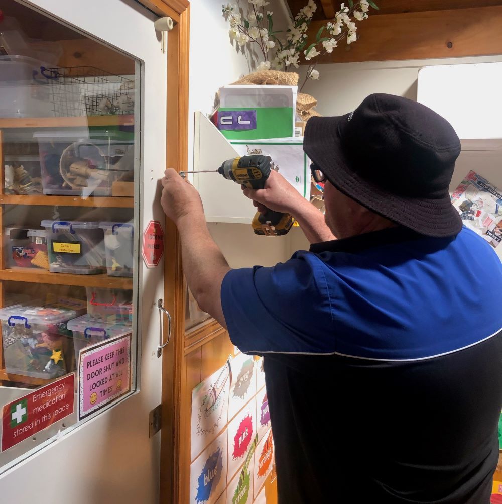 Locksmith installing locks