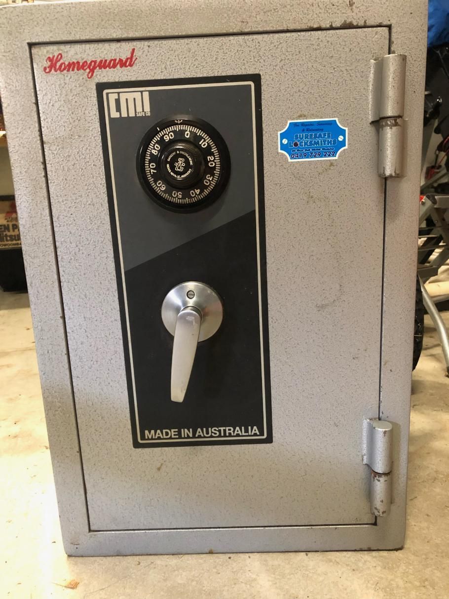 A Safe Made in Australia is Sitting on a Concrete Floor — Suresafe Locksmiths in Glenvale, QLD