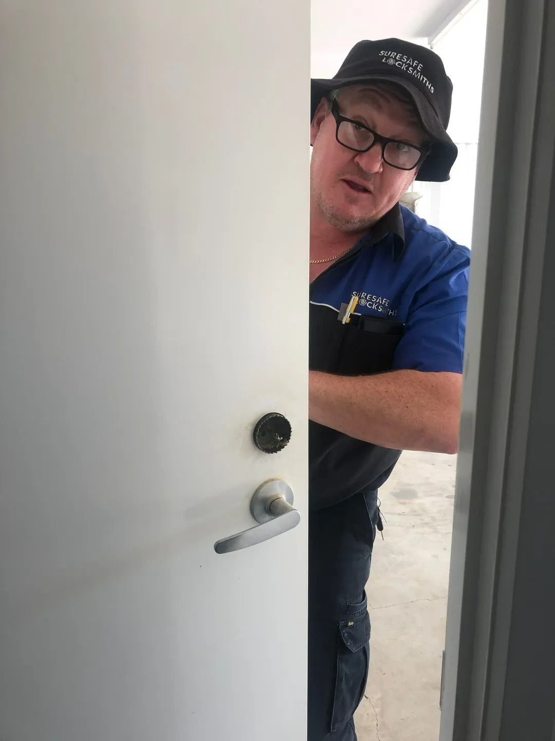 A Car Key is Sitting on the Steering Wheel of a Car — Suresafe Locksmiths in Glenvale, QLD