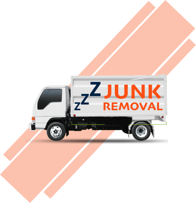 A white junk removal truck is driving down a road.