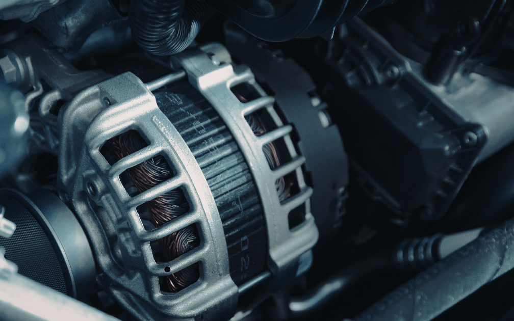 a roadside mechanic removing a car rim