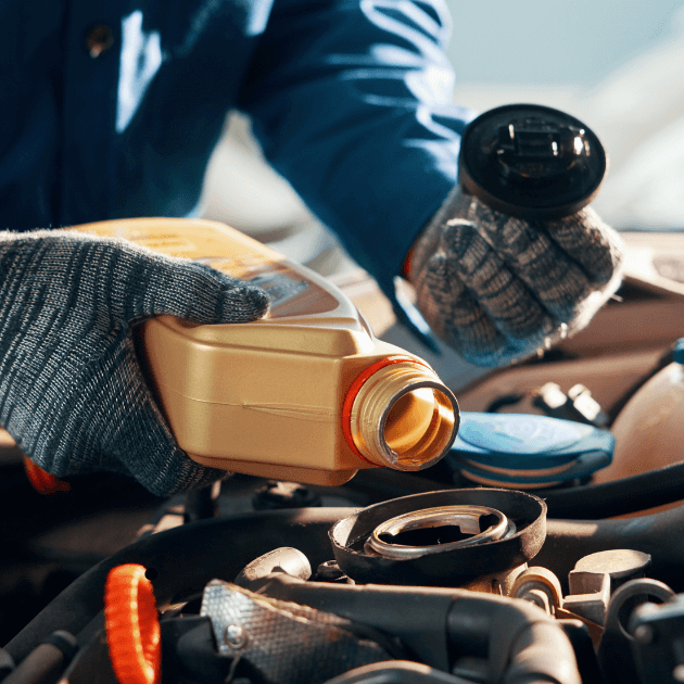 mechanic doing an oil change