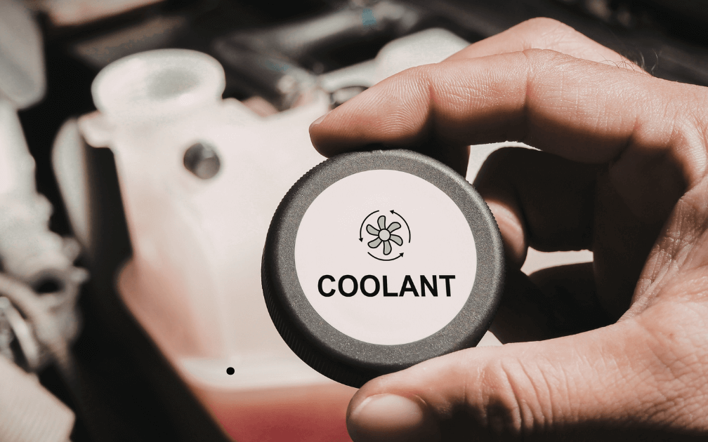 a mechanic doing a pre-purchase inspection on a white car with white interior seats