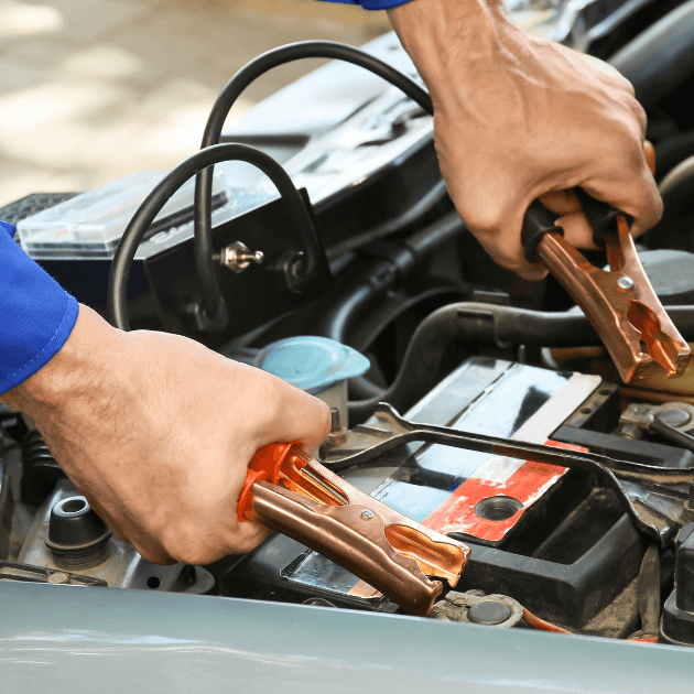 mechanic jumping a car that won't start
