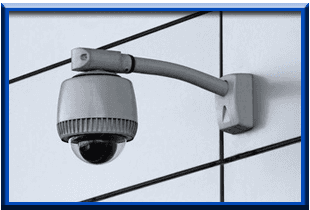 security camera mounted on a wall 
