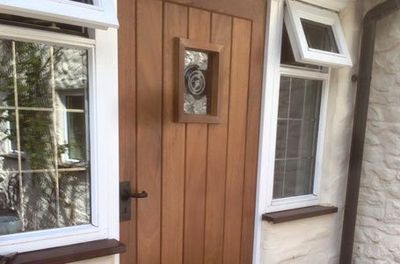 handcrafted doors and window installed for home