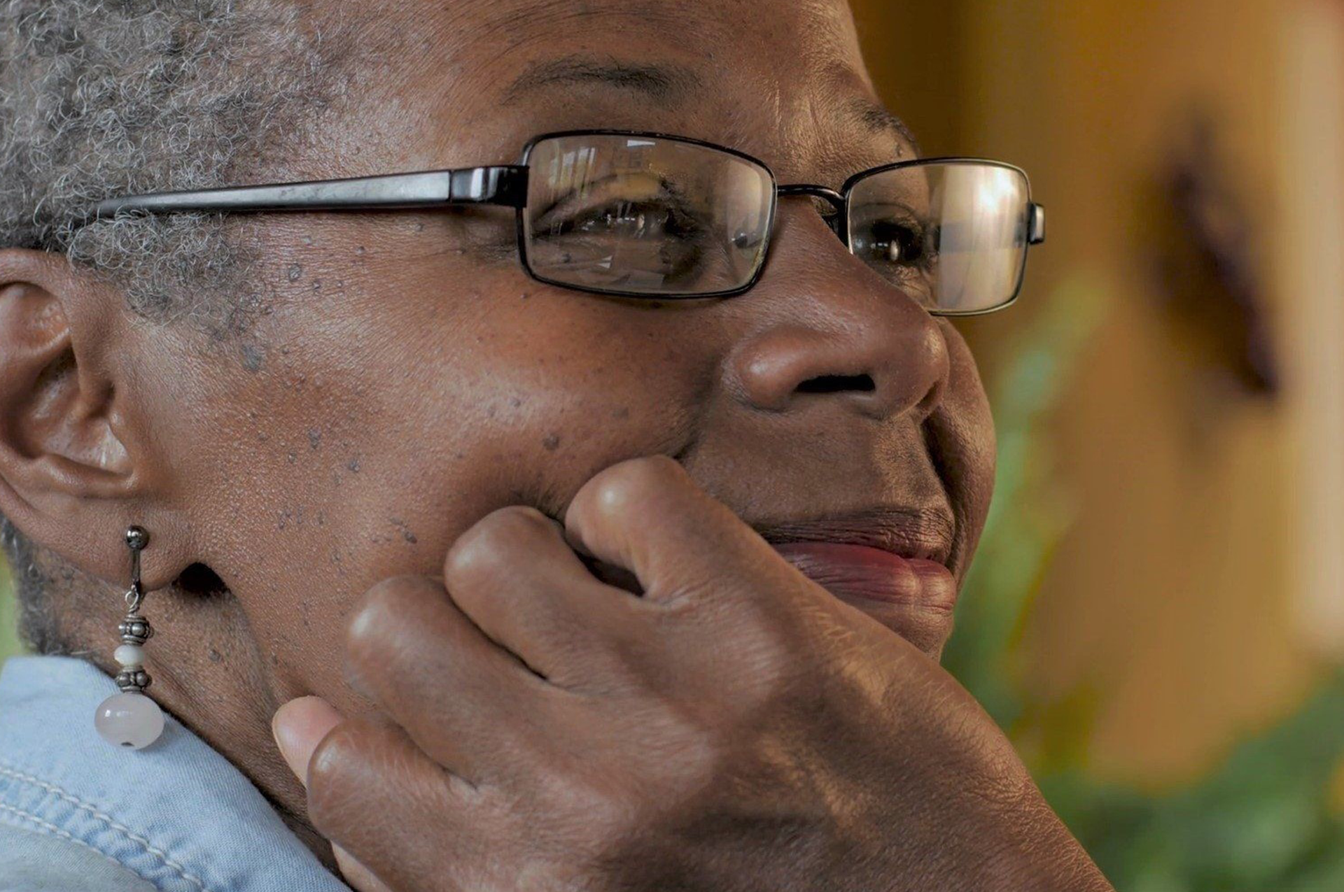 Senior Woman Smiling While Painting — Glenview, IL — Bethany Methodist