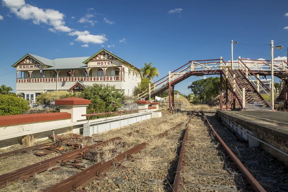 Train Station With a Bridge Over the Tracks — Lange's Fencing and Landscaping Centre in Gympie, QLD