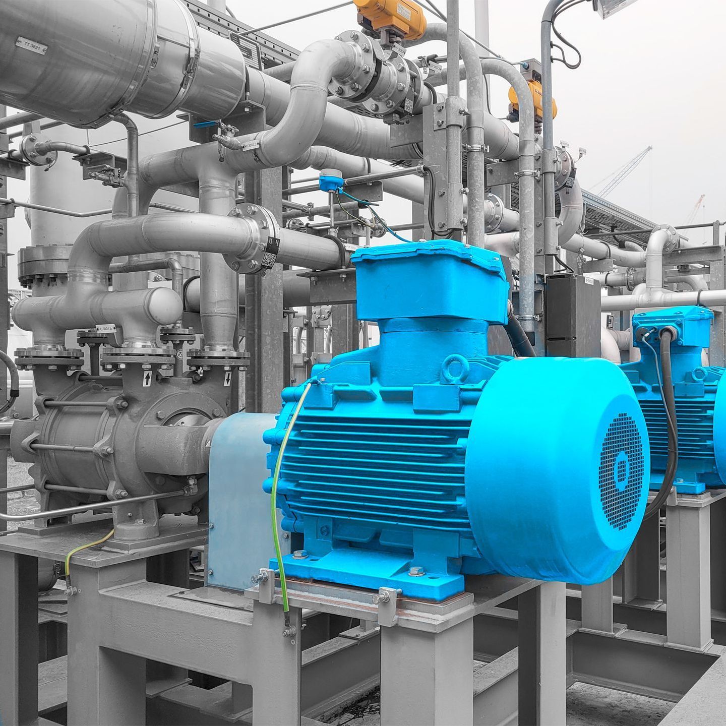 A bunch of pipes are connected to a machine