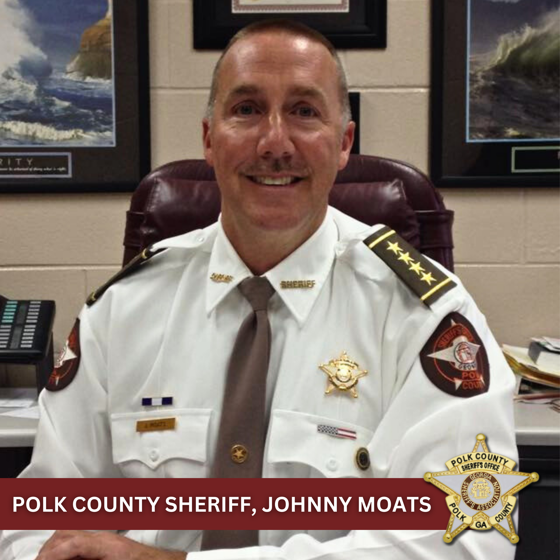 Sheriff Johnny Moats Seated at Desk