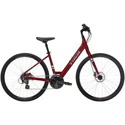 A red and black bicycle on a white background.