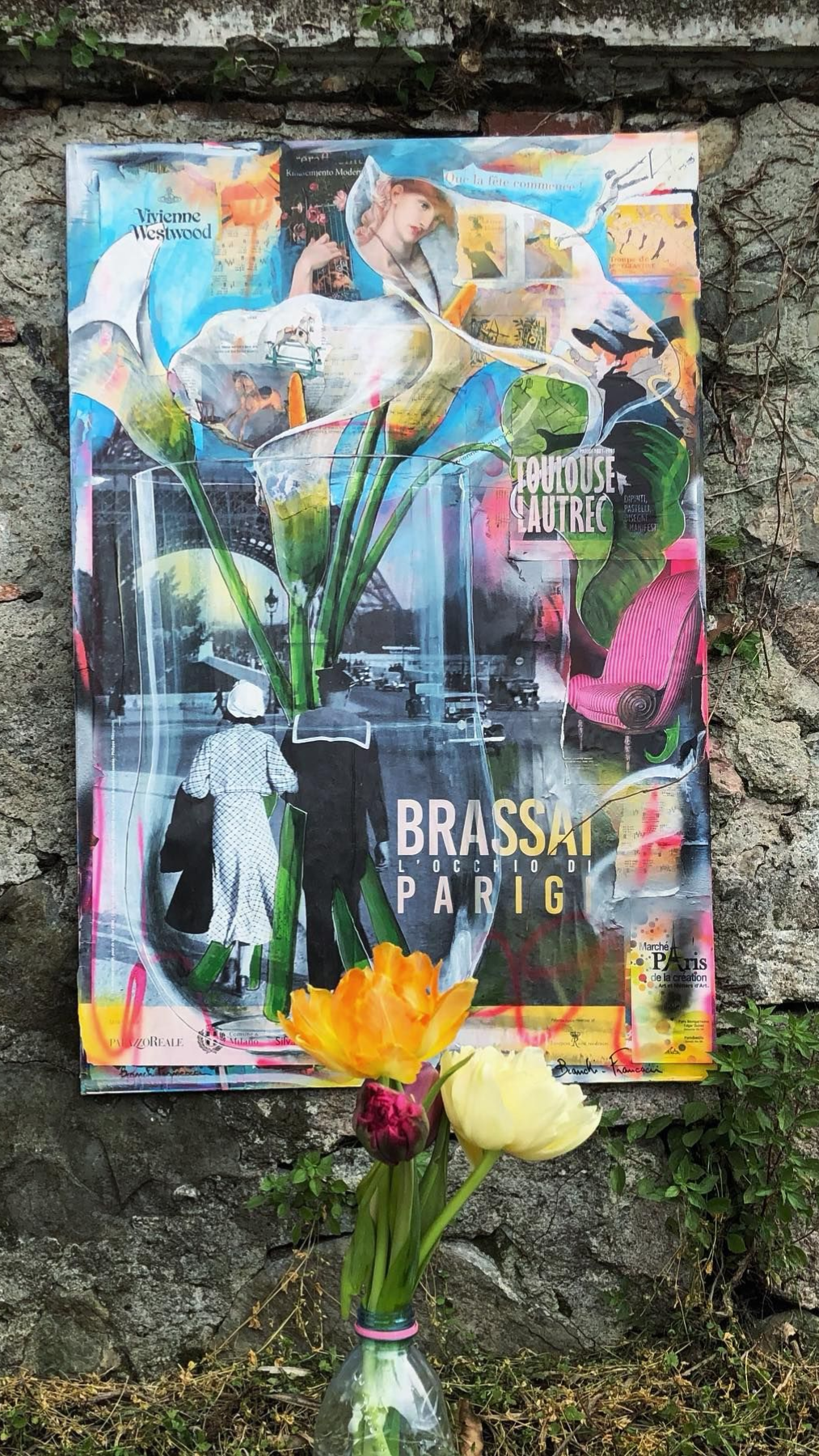 Un poster realizzato con la tecnica del collage e recante la scritta 