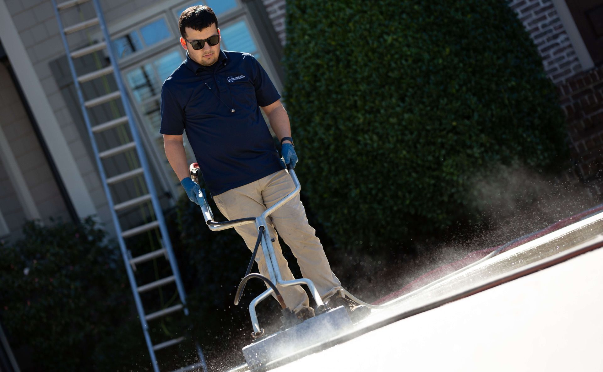 cleaning a driveway